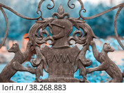 Russia, Sverdlovsk region, July 2021: Coat of arms of the Demidovs on the fence around the Nevyansk tower. Редакционное фото, фотограф Акиньшин Владимир / Фотобанк Лори