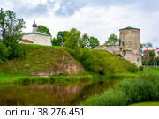 Pskov, Gremyachaya fortress tower and the ancient Church of Kozma and Damian from Gremyachaya mountain (2019 год). Стоковое фото, фотограф Ольга Остроухова / Фотобанк Лори