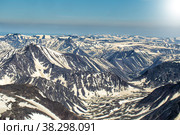 Northern landscape. The mountains are covered with glaciers. View from helicopter flight altitude. Стоковое фото, фотограф Евгений Ткачёв / Фотобанк Лори