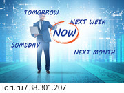 Concept of procrastination with now or later. Стоковое фото, фотограф Elnur / Фотобанк Лори