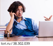 Young writer working on his new work. Стоковое фото, фотограф Elnur / Фотобанк Лори