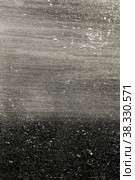 Abstract horizontal black and white background with spots and scratches. Стоковая иллюстрация, иллюстратор Ирина Кротова / Фотобанк Лори