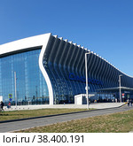SIMFEROPOL, CRIMEA - September 30, 2019: Close-up of the entrance to the modern passenger terminal of Simferopol International Airport. View from the square. Редакционное фото, фотограф Оксана Медведева / Фотобанк Лори