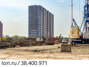 Construction site on which the tower crane operates, storage of materials for the manufacture of the metal frame. Стоковое фото, фотограф Дмитрий Коростылев / Фотобанк Лори