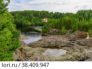 Remains of the crater of the ancient paleo volcano Girvas in the bed of the Suna River. Стоковое фото, фотограф Михаил Аккуратoв / Фотобанк Лори