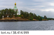 Church of St. Nicholas the Wonderworker and the coastline of the monastery bay of Valaam Island. (2021 год). Редакционное фото, фотограф Михаил Аккуратoв / Фотобанк Лори