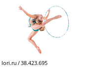 A gymnast girl in an emerald swimsuit performs an exercise with a hoop isolated on a white background. Стоковое фото, фотограф Мария Мороз / Фотобанк Лори