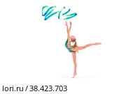 Gymnast girl in an emerald swimsuit performs an exercise with ribbon isolated on white background. Стоковое фото, фотограф Мария Мороз / Фотобанк Лори