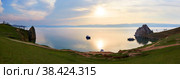 Sunset on Lake Baikal, Olkhon Island in summer. Panoramic view of the Khuzhir Bai and the Burhan chain, Shamanka. Стоковое фото, фотограф Виктория Тельминова / Фотобанк Лори