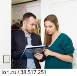 Caseworker helping woman polling questionnaire. Стоковое фото, фотограф Яков Филимонов / Фотобанк Лори