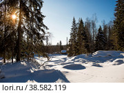 Winter landscape of Ruskeala Park. Ruskeala waterfalls under snow at sunset and suspension bridges. Beautiful winter landscape. Russia, Republic of Karelia. (2018 год). Стоковое фото, фотограф Photojuli / Фотобанк Лори