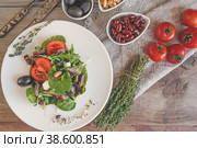 Beans red and white, olives and lettuce leaves to prepare a dietary meal for a healthy diet. The fight against excess weight. Copy space. Стоковое фото, фотограф Оксана Медведева / Фотобанк Лори
