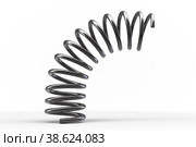 Metal spring bounces off the surface. Стоковое фото, фотограф Happyphotons / Фотобанк Лори