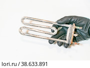 Fragment of the heating element of the washing machine. Стоковое фото, фотограф Siarhei Starastau / Фотобанк Лори