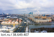Panorama of Khamovniki, a district in the central part of Moscow, a multi-lane highway and a view of the city from a height, Frunzenskaya Embankment and the Third Transport Ring. Стоковое фото, фотограф Mikhail Starodubov / Фотобанк Лори