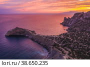 Novyi Svit, Crimea, Sudak. Aerial view of Cape Kapchik during beautiful sunset. Black Sea (2020 год). Стоковое фото, фотограф Igor Tichonow / Фотобанк Лори