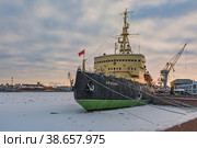 St. Petersburg, Russia January 07, 2023: The legendary icebreaker Krasin is permanently moored at the port berth on the Neva River. Museum of the World Ocean. Historic ship, conqueror of the Arctic. Редакционное фото, фотограф Владимир Ендовицкий / Фотобанк Лори