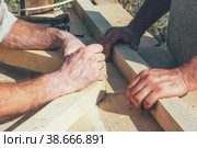 The hands of the workers carpenters, joiners. Стоковое фото, фотограф Андрей С / Фотобанк Лори