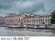 View of the Beloselsky-Belozersky Palace or Sergievsky Palace and the former manor of the Trinity Sergius Lavra, Fontanka River embankment, cultural heritage site, stylized: St. Petersburg, Russia - 08 October 2022. Редакционное фото, фотограф Алексей Голованов / Фотобанк Лори
