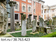 Istanbul, Turkey - January 01, 2021: Remnants of ancient columns in the courtyard of Archaeological museum in Istanbul. Редакционное фото, фотограф Яков Филимонов / Фотобанк Лори