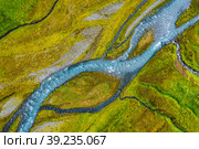 Aerial top down view of glacial river in Iceland, drone shot. Стоковое фото, фотограф Igor Tichonow / Фотобанк Лори