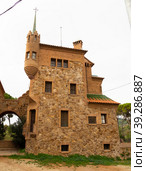 View of exterior of House of Master and School of Colonia Guell. Стоковое фото, фотограф Яков Филимонов / Фотобанк Лори