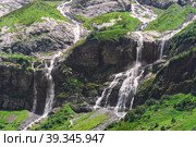 Concept of great nature mountain range and tourism in Russia. Amazing view of caucasus mountain forest, river and Sofia waterfalls landscape, green forest, mount peak, sunny summer day. Russia, Arkhyz. Стоковое фото, фотограф Евгений / Фотобанк Лори