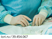 Interventional radiology. surgeon radiologist at operation during catheter based treatment with X-ray visualization. Стоковое фото, фотограф Дмитрий Калиновский / Фотобанк Лори