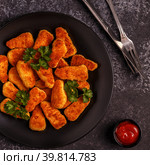 Chicken naggets with sauces on dark background. Стоковое фото, фотограф Татьяна  Бральнина / Фотобанк Лори