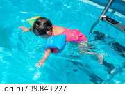Kid in a swimming pool. Стоковое фото, фотограф Luis Louro / PantherMedia / Фотобанк Лори