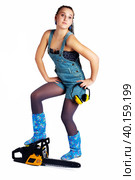 Young pretty woman with chainsaw over white. Стоковое фото, фотограф Сергей Буторин / Фотобанк Лори
