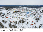 Западная Сибирь, Ханты-Мансийский автономный округ: село Русскинская. Вид с воздуха. Western Siberia, Khanty-Mansi Autonomous Okrug: Russkinskaya village. Aerial view. (2022 год). Стоковое фото, фотограф Евгений Романов / Фотобанк Лори