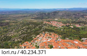 Aerial View Of Small Rural Castle In Mountains And Village (2019 год). Стоковое видео, видеограф Кирилл Трифонов / Фотобанк Лори