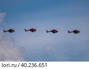 Moscow Russia Zhukovsky Airfield 25 July 2021: aerobatic SARANG Indian helicopter flight team t of the international aerospace salon MAKS-2021. Стоковое фото, фотограф Фотограф / Фотобанк Лори