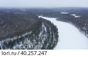 Западная Сибирь: вид на зимнюю тайгу с воздуха. Western Siberia: a view of the winter taiga from the air. Стоковое видео, видеограф Евгений Романов / Фотобанк Лори