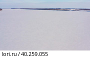 Западная Сибирь: река Обь зимой. Вид с воздуха. Western Siberia: the Ob River in winter. Aerial view. Стоковое видео, видеограф Евгений Романов / Фотобанк Лори