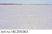 Западная Сибирь: река Обь зимой. Вид с воздуха. Western Siberia: the Ob River in winter. Aerial view. Стоковое видео, видеограф Евгений Романов / Фотобанк Лори