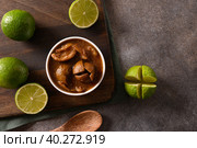 Home made Sri Lankan Lime Pickle of lime, salt, chilli, pepper. Стоковое фото, фотограф Светлана Лажко / Фотобанк Лори