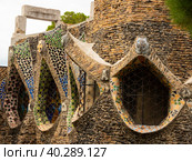 Exterior view of guell crypt, masterpiece gaudi architecture located at catalunya outside town. Стоковое фото, фотограф Яков Филимонов / Фотобанк Лори