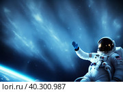 Cosmonaut in outer space. April 12 - Cosmonautics Day. Image generated by artificial intelligence. Стоковое AI-изображение, AI-художник Сергей Елизарьев / Фотобанк Лори
