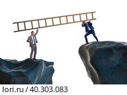 Business people helping to go over chasm. Стоковое фото, фотограф Elnur / Фотобанк Лори
