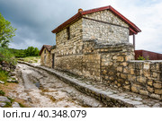 Estate of Abraham Firkovich (Karaite writer and archeologist) built in 18th century in the famous ancient city-fortress Chufut-Kale ("Jewish Fortress" in Turkish) in the Crimean Mountains (2019 год). Стоковое фото, фотограф Сергей Фролов / Фотобанк Лори