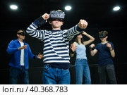 Boy child playfully poses in virtual reality glasses. Стоковое фото, фотограф Яков Филимонов / Фотобанк Лори