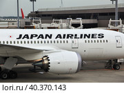Tokyo, Japan - 10 Nov 2013: The airplane of Japan Airlines in the airport, Tokio, Japan. Редакционное фото, фотограф Сергей Стрелков / Фотобанк Лори