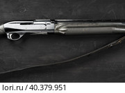 Smoothbore hunting gun on black background close up. Стоковое фото, фотограф Сергей Толмачёв / Фотобанк Лори