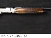 Smoothbore hunting gun on black background close up. Стоковое фото, фотограф Сергей Толмачёв / Фотобанк Лори