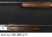 Smoothbore hunting gun on black background close up. Стоковое фото, фотограф Сергей Толмачёв / Фотобанк Лори