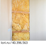 Glass wool - the thermal insulation material under PVC panels. Стоковое фото, фотограф Володина Ольга / Фотобанк Лори