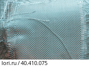 Fiberglass composite raw material. Fiberglass fabric in close-up. Fiberglass cloth. Background image. Стоковое фото, фотограф Воловодов Владимир / Фотобанк Лори
