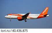 Airplane EasyJet airline lands on the runway in an aeroport El Prat city of Barcelona. Board number G-EZFZ (2020 год). Редакционное фото, фотограф Яков Филимонов / Фотобанк Лори